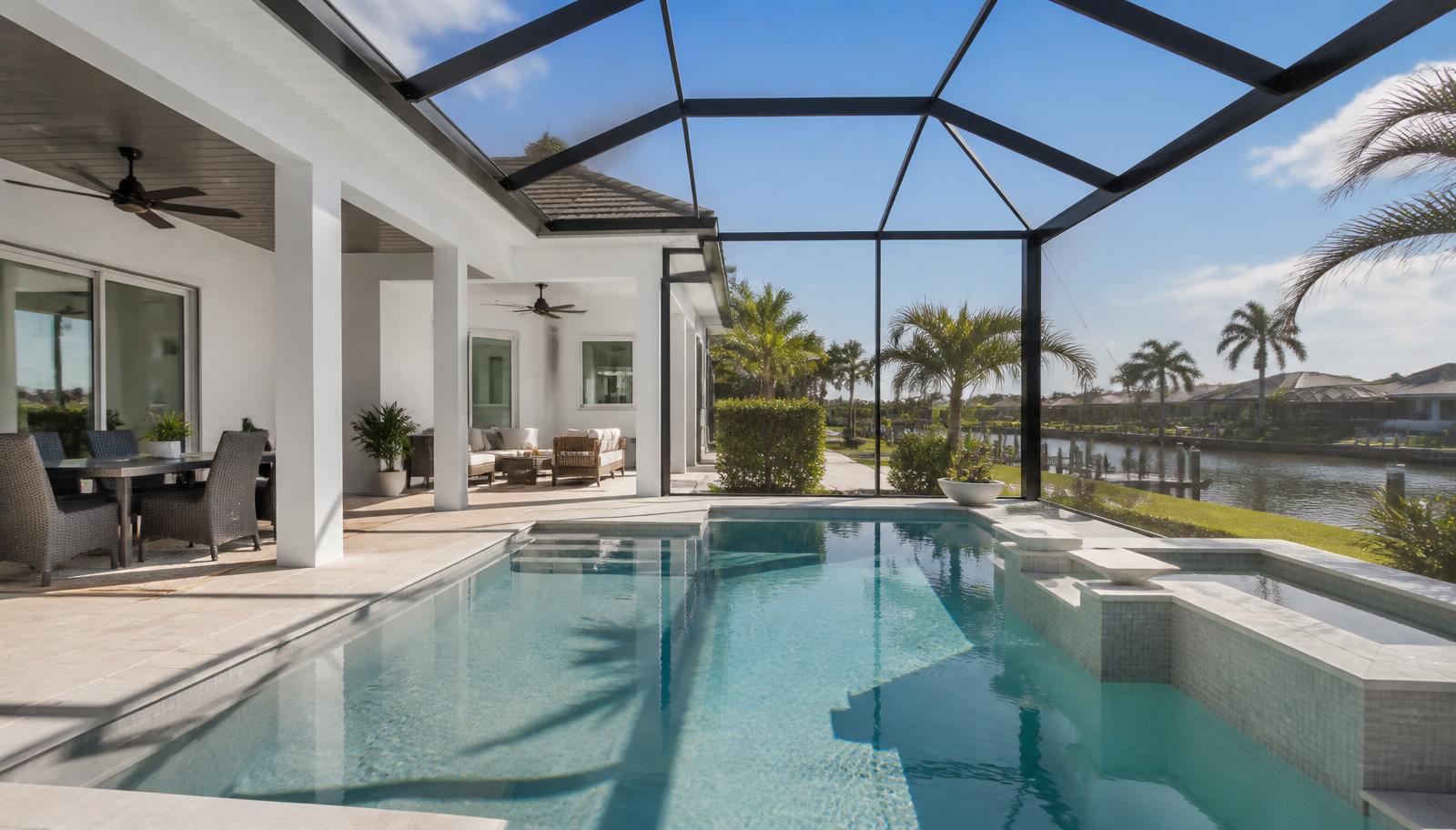 Pool equipment pad and clear residential pool at a Florida home during an inspection